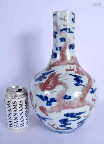 A 19TH CENTURY CHINESE BLUE AND WHITE IRON RED VASE