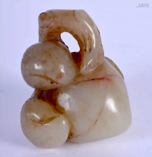 AN EARLY 20TH CENTURY CHINESE CARVED GREEN JADE