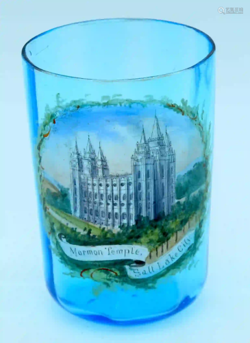 A small porcelain enamel glass depicting a Mormon