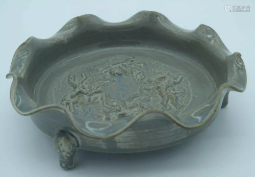 A Chinese carved Celadon three legged porcelain censer