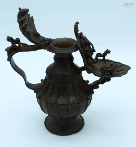 A Chinese Tibetan bronze water jug 27cm x 29cm.
