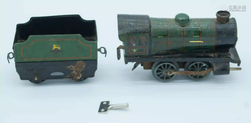 A Hornby wind up Tin plate model train and carriage