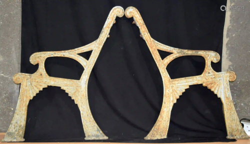 A pair of Art Deco cast iron bench ends in the style of