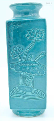 A Chinese green ground Kong vase decorated with lotus