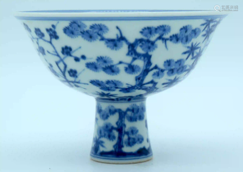 A Chinese blue and white Stem cup decorated with Plum,