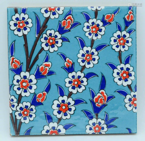 An Islamic floral pattern tile 20 x 20cm .