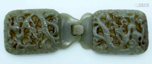 A Chinese Jade belt buckle 14.5 x 4.5cm.