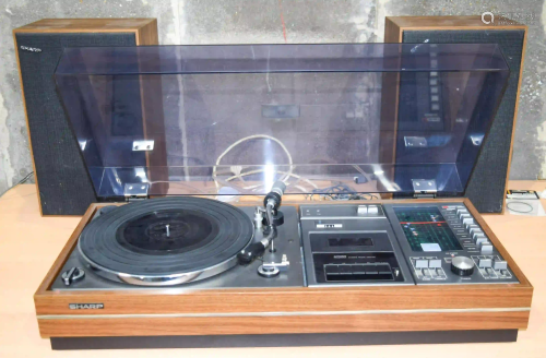 A vintage Sharpe SG315E Music Centre 76 x 34cm.