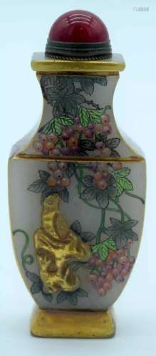 A Chinese Peking glass snuff bottle 9cm.