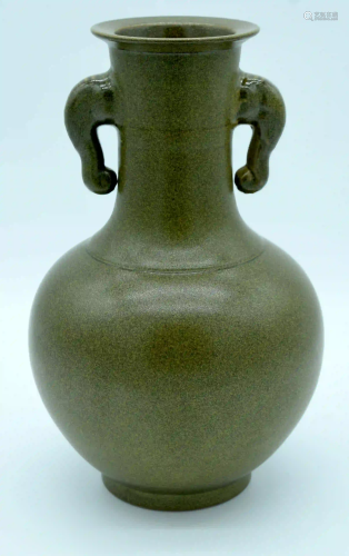 A Chinese tea dust glazed vase with twin Elephant