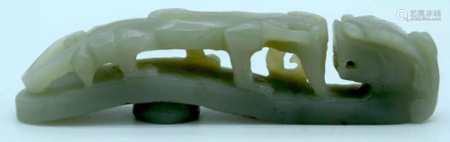 A Chinese carved jade buckle 10cm.