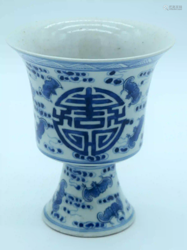 A Chinese blue and white stem cup decorated with