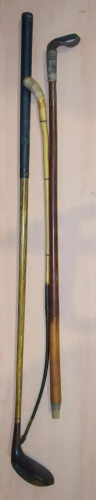 A vintage hickory shaft Golf club and two horse whips