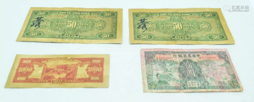 A collection of Four Chinese bank notes (4).