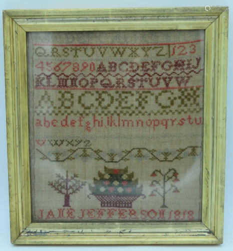 A framed Victorian sampler dated 1818.