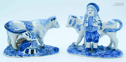 Two Delft pottery figures of Cows and farm hands 13 x