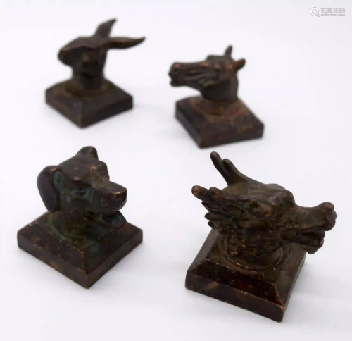 A group of Chinese bronze seals in the form of animals