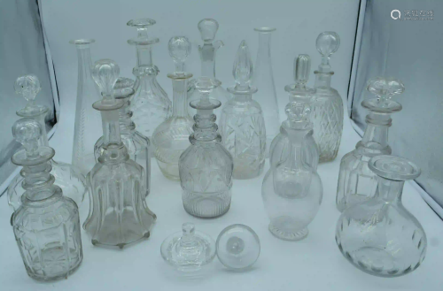 A collection of glass decanters (16).