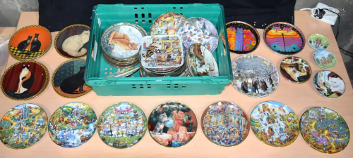 A large group of collectors plates many cat related