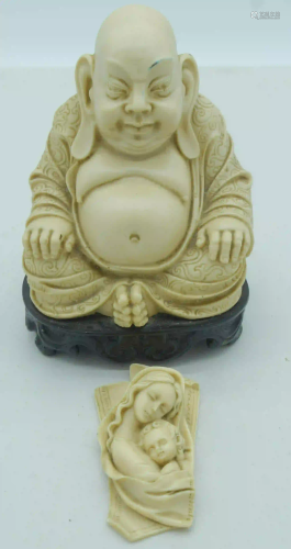 A Faux Buddha and a small European plaque Largest 20cm