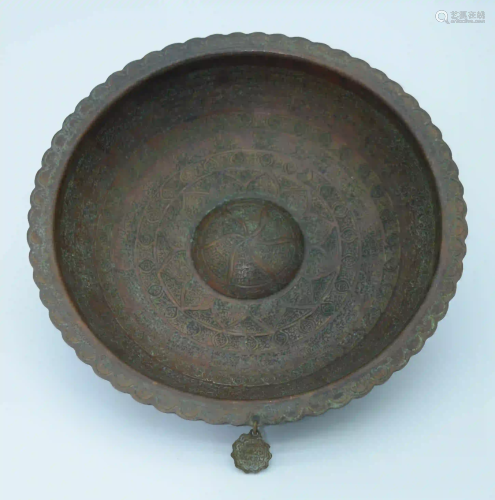 Islamic bronze magic bowl embossed with calligraphy