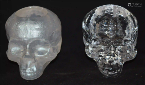 Two contemporary Swedish glass skulls possibly candle
