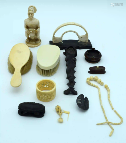 A collection of bone items including sculptures ,