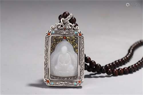 A Chinese Silver and Jade Pendant