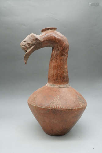 A Ceramic Vase with a Duck Mouth