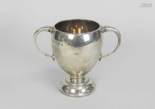A silver presentation two handled trophy cup