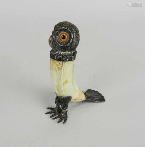 A tooth or horn pepperette in the form of an owl