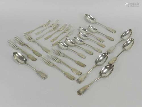 A collection of silver flatware