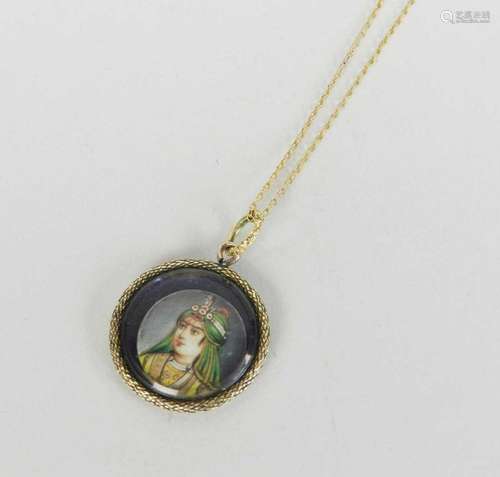 A miniature portrait pendant