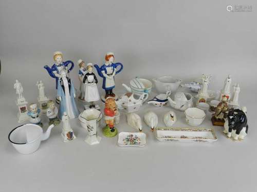 A collection of porcelain figures of nurses including Royal Worcester, Royal Doulton, Coalport,