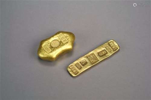 Two Chinese Gilt Ingots