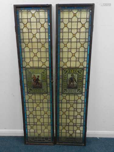 A pair of framed full-height leaded glass doors in the Renaissance style with amber bull eye centres