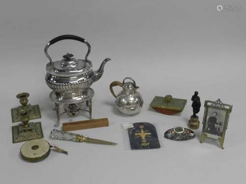 An assembled group of metalware and electroplate including a spirit kettle on stand, a Guernsey-type