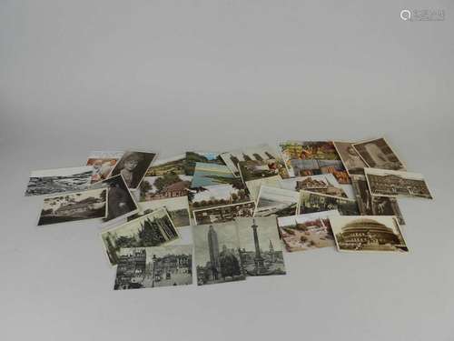 A collection of loose postcards, mostly early 20th century, including topographical and portrait