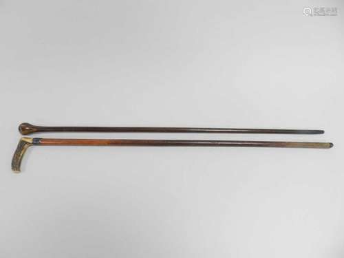 A horn-handled cane, with silver collar on a tapering birch cane, 89cm long, together with an inlaid