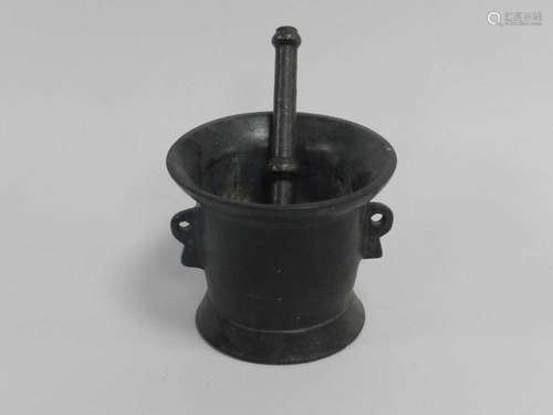 An 18th-century style bronze pestle and mortar, the 16cm long pestle with knop stem the mortar