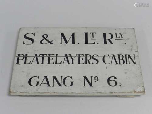 A Shropshire & Montgomeryshire Light Railway railside sign, painted wood, inscribed 'S&M.Lt.Rly. /