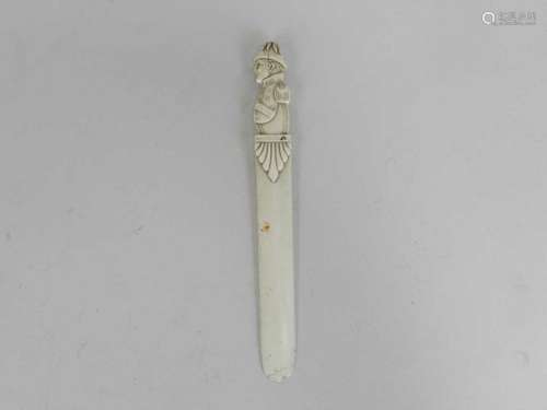 A carved ivory page turner, late 19th century, the handle modelled as the Duke of Wellington, 24.5cm