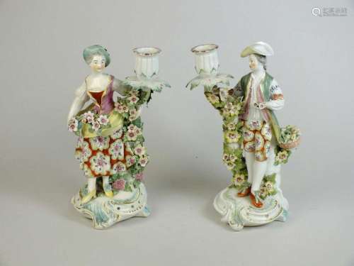A pair of Derby porcelain candlesticks, circa 1760