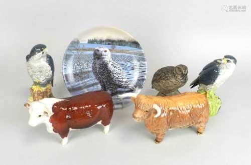 Beswick models of a Highland Bull and a Hereford Bull together with two Royal Doulton Peregrine