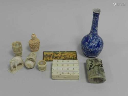An assembled group of Asian works of art, 19th Century and later, including two carved bone gaming