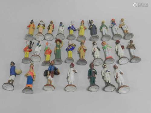 A collection of Indian carved and painted plaster educational figures.