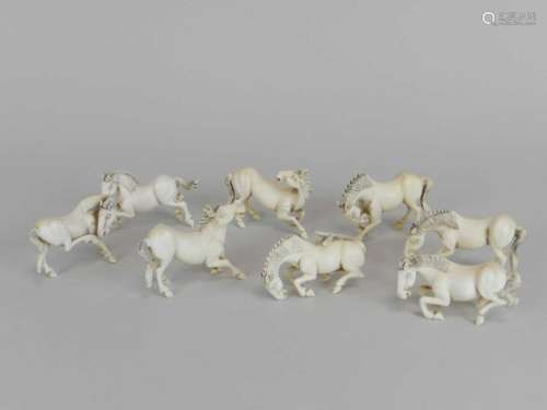 A set of eight carved Chinese carved ivory horses of Mu Wang, 19th century, in Ming style,