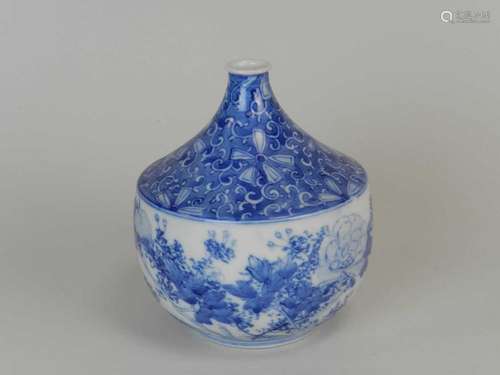 A Japanese Arita blue and white bottle vase, Taisho period, of mallet shape with narrow neck and