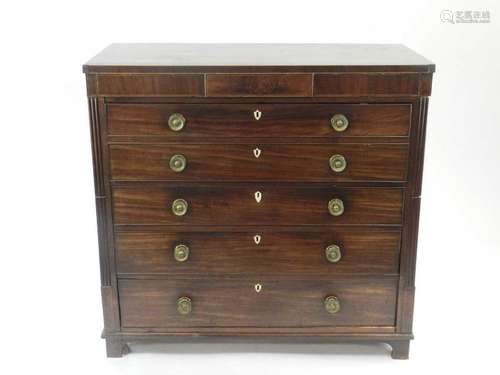 A Victorian mahogany and boxwood strung secretaire chest, having a concealed frieze drawer above a