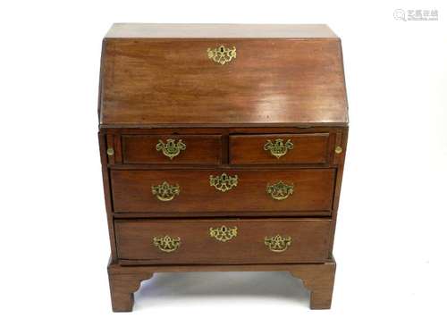 A George III mahogany bureau, the fall front above two short and two long drawers, raised on bracket